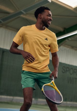 adidas Performance FREELIFT TEE - Sports T-shirt - gelb