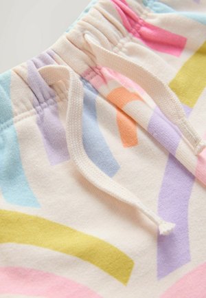 Pantaloni din material moale cu talie elastică și șnur, având modele colorate de dungi curbate în albastru pastel, roz, portocaliu, galben și mov.