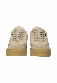 Beige sneakers with a suede upper and fluffy textile accents, featuring a round toe, textured rubber sole, and flat laces.