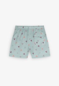 Lichtblauwe zwemshorts met een patroon van kleine schedels in paars en koraal. Elastische tailleband en een enkele achterzak met klep.