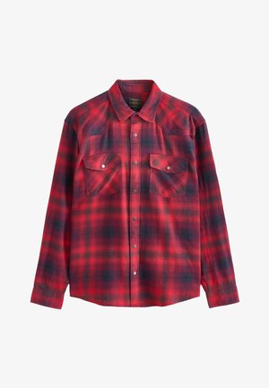 Czerwona i czarna koszula flanelowa w kratę z długimi rękawami, dwie kieszenie na piersi z zatrzaskami oraz szpiczasty kołnierzyk. Miękka w dotyku, zapięcie na guziki z przodu.