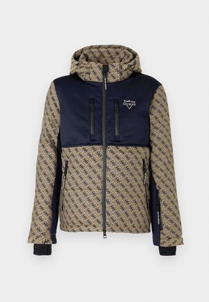 Beżowa i granatowa kurtka z kapturem, z logo w całym wzorze, kieszeniami zapinanymi na zamek oraz logo "Guess" na piersi, posiadająca otwory na kciuki w rękawach.