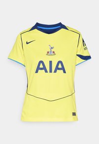 Žuti Nike sportski dres s plavim naglascima, s okruglim izrezom, kratkim rukavima i logotipom na grudima. Dizajn ima teksturiranu završnu obradu.