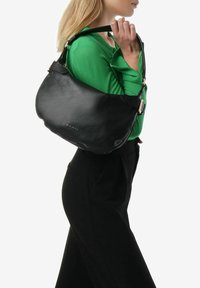 Miriade Borsa a mano - nero