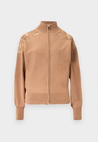 Beige sweater met ritssluiting gemaakt van zachte stof, met geribbelde manchetten en zoom, en geborduurde bloemenaccenten op de schouders.