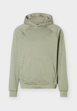 Lichtgroene Nike sweatvest met capuchon, lange mouwen, voorzak en klein swoosh-logo op de borst.