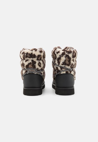 Boots with a soft, brown and cream patterned upper, black rubber sole, and gray laces. The design features a gathered top for a snug fit.