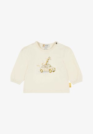 Maglietta per neonato a maniche lunghe color crema con un'illustrazione di una giraffa che spunta da una piccola auto sulla parte frontale e un bottone vicino allo scollo.
