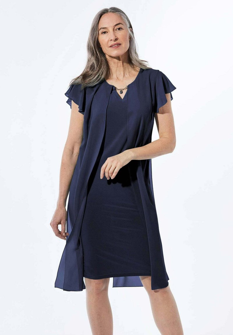 Marineblaues Kleid mit taillierter Silhouette und ausgestellten Ärmeln. Hergestellt aus einem glatten Stoff, verfügt es über einen V-Ausschnitt und ein offenes Frontdesign.