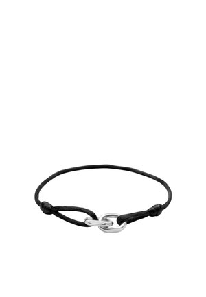 Tynd sort snorarmbånd med to sølvflettede ovale ringe i midten og knob, der sikrer ringene på hver side.