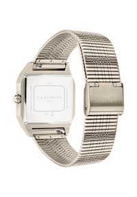 Orologio in acciaio inossidabile con cassa quadrata minimalista, bracciale a rete e finitura lucida. Presenta un fondello in vetro trasparente con incisione del marchio.