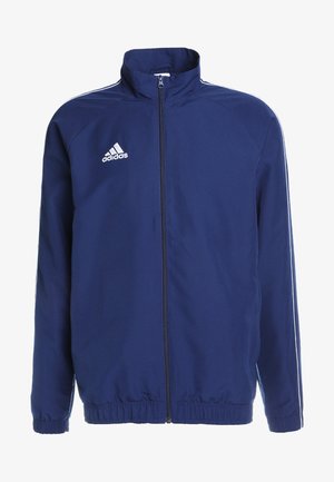 Blaue Trainingsjacke mit Reißverschluss, elastischen Bündchen und Saum, weißem Adidas-Logo auf der Brust und zwei weißen Streifen entlang der Schultern.