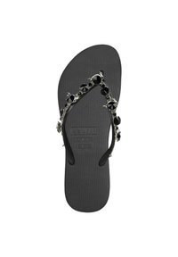 Black flip-flop featuring a textured sole and decorative strap with black studs, affixed to a flexible black footbed. Size EUR 37/38.
