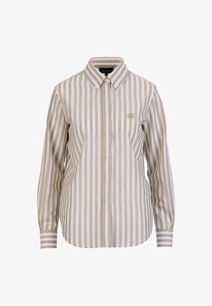 Hosszú ujjú, bézs és fehér függőleges csíkos, gombos ing hegyes gallérral és kis hímzett logóval a mellkason.