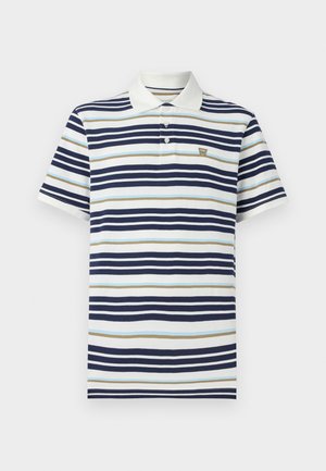 Marinblå, ljusblå och beige randig pikétröja. Tillverkad av bomull med klassisk krage och treknapprad. Litet logo på bröstet.