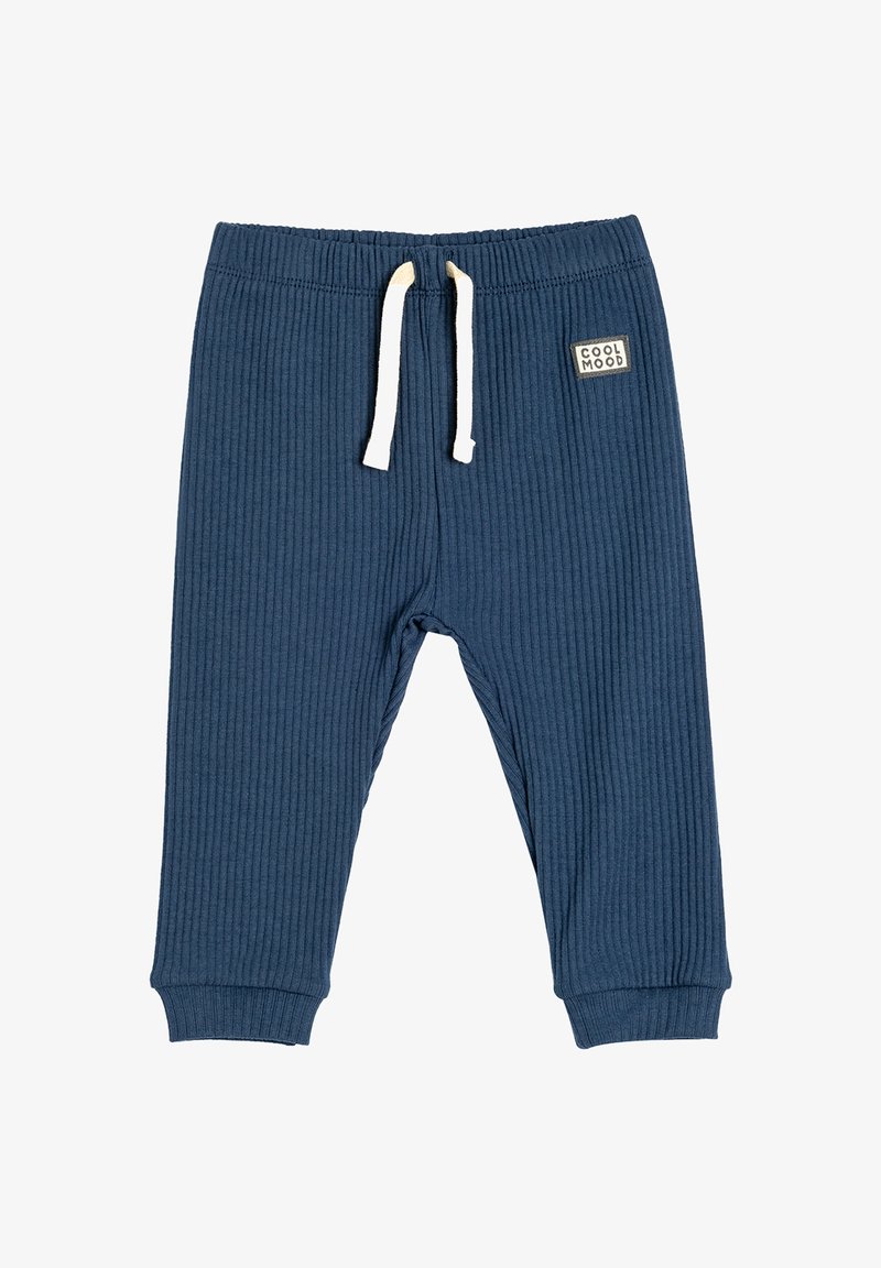Joggers en velours côtelé marine avec taille élastique, cordon de serrage blanc et patch logo. Poignets aux chevilles pour un style ajusté. Texture douce.