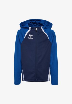 Marineblå hættetrøje med hvide detaljer, fuld lynlås og en struktureret hætte. Har lange ærmer og et sporty design, der er velegnet til aktivt tøj.