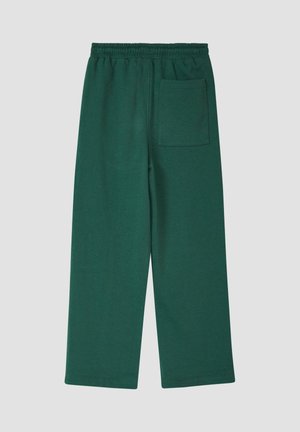 Donkergroene broek met elastische taille, wijde pijpen en een enkele opgestikte zak aan de achterkant aan de rechterkant.