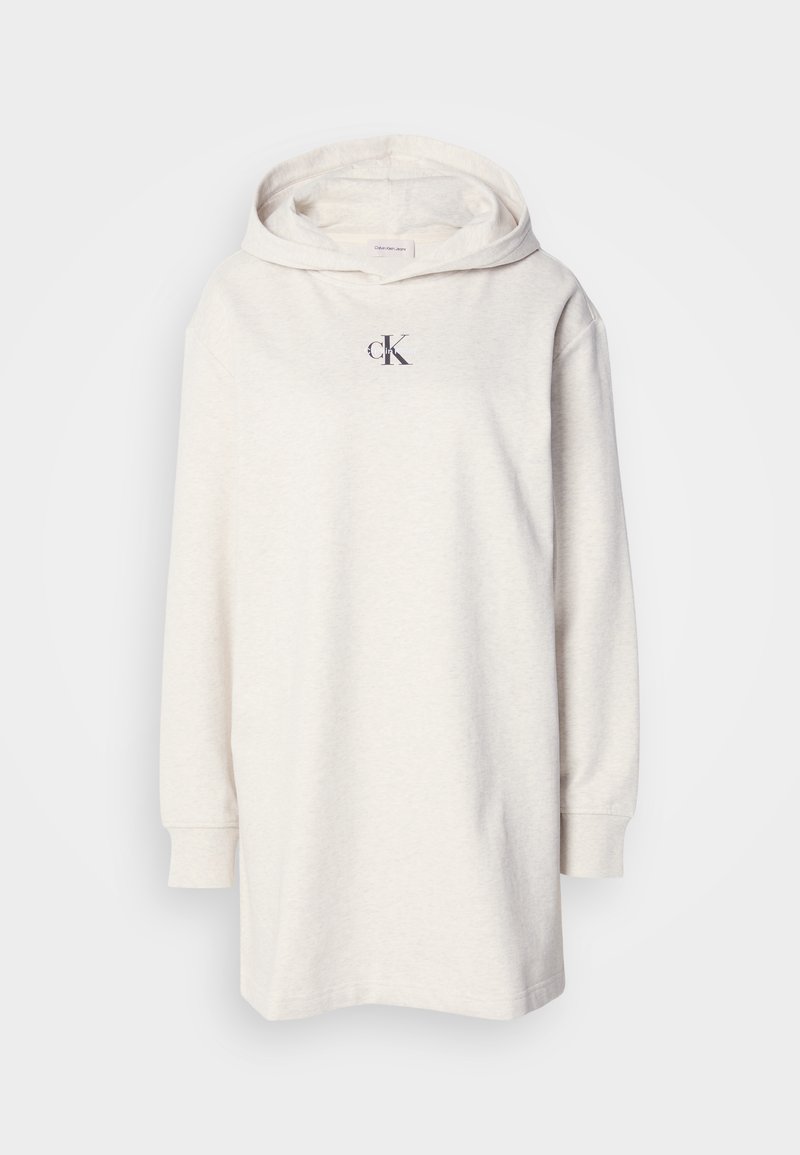 Hoodie in lichtbeige katoenmix, met lange mouwen en een klein donker logo op de borst. Losse pasvorm met een zachte textuur.