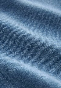 Next SUPER SOFT  PETITE - Flared Jeans - mid blue denim
