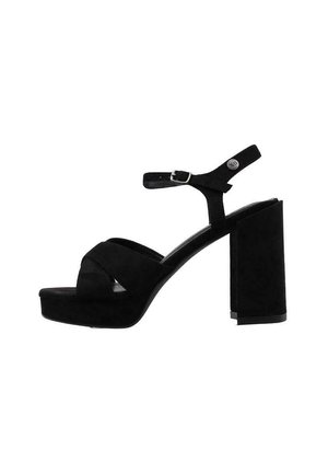 Sandalias de plataforma negras de ante, con un diseño de tiras cruzadas, hebilla en el tobillo y un tacón alto y ancho para mayor estabilidad.
