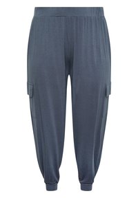 Mörkgrå lösa joggerbyxor med elastisk midja, sidofickor med klaff och åtsittande muddar vid anklarna.