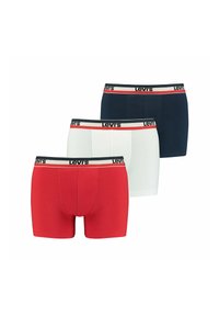 Kolme paria Levi's miesten boxereita punaisena, valkoisena ja laivastonsinisenä, joissa on musta vyötärönauha punaisella ja valkoisella logotyyppauksella.