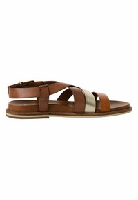 Sandales en cuir avec des brides marron et dorées métalliques, au design minimaliste, avec une ouverture à l'avant et une semelle plate ornée de surpiqûres légères en contraste.
