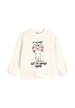 Felpa color crema con scollo rotondo e maniche lunghe. Presenta una grafica di un gatto dei cartoni animati con occhiali rosa e testo nero sotto.