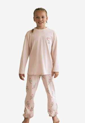 Ljust rosa långärmad skjorta med en liten godis hjärt-design; matchande rosa byxor prydda med godismotiv och gröna rosetter; mjukt tyg.