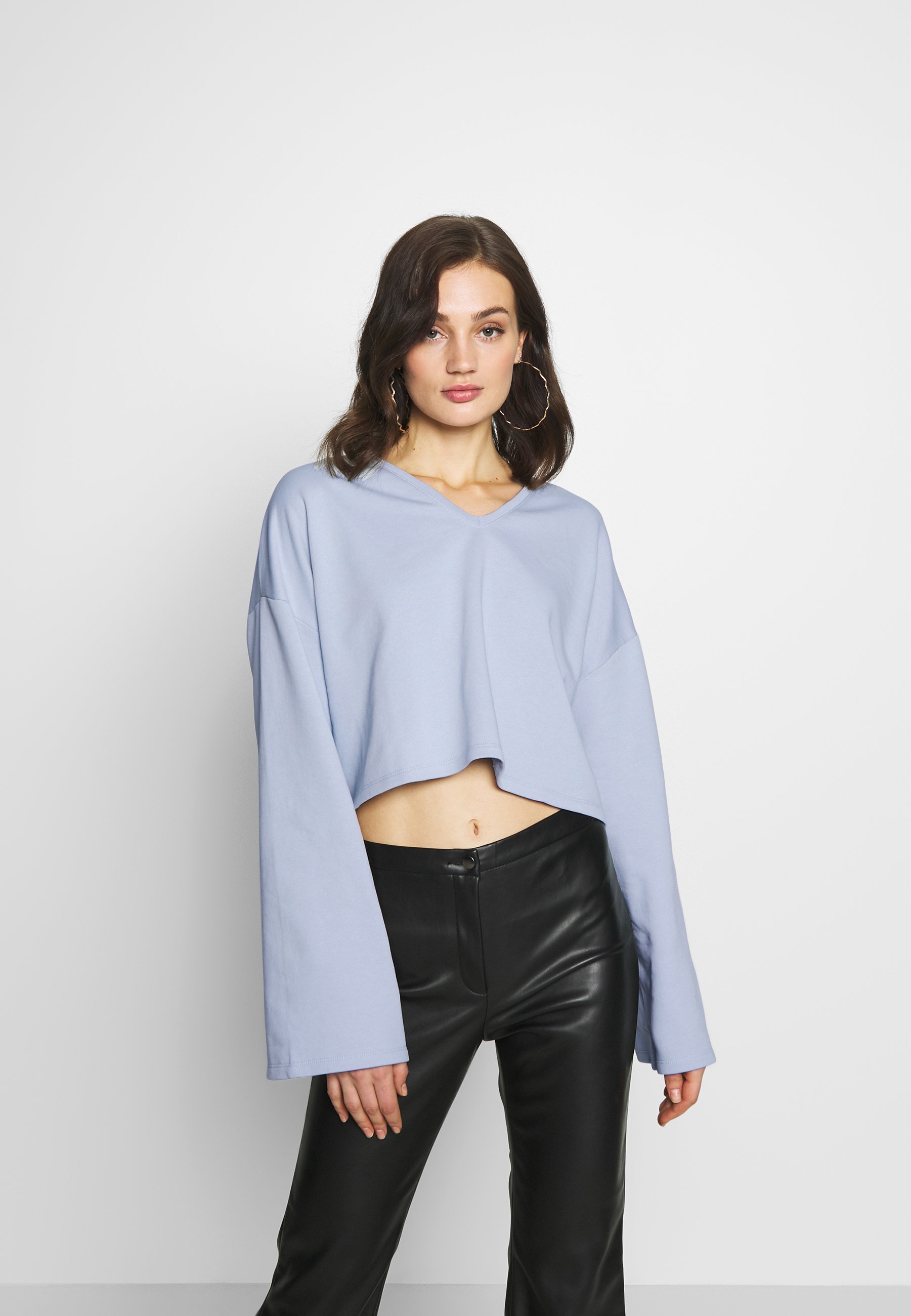 oversized light blue sweatshirt