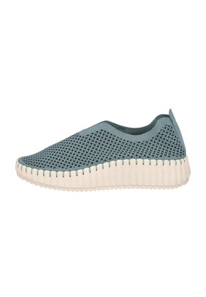Zapato sin cordones con parte superior tejida en azul y suela blanca gruesa y texturizada, con una lengüeta en el talón para facilitar su colocación.