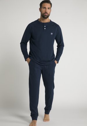 Navy blue long-sleeve top with a henley collar and three buttons, paired with matching jogger pants. Soft fabric, casual fit.