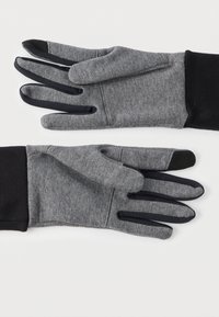Szürke érintőképernyős kesztyűk fekete részletekkel, puha szövetszerkezettel, testhezálló kialakítással és ujjnyílásokkal a jobb ügyesség érdekében.