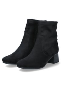 Bottines noires à la texture lisse et daim, dotées d'une fermeture éclair sur le côté et d'un petit talon carré. Design classique avec des pointes effilées.