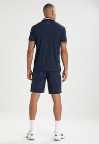 Fila SHORTS SANTANA - Calções desportivos - peacoat blue