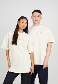 LEGACY STUDIOS UNISEX - Triko s potiskem - cream