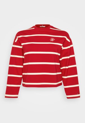 Red long-sleeve shirt with horizontal white stripes, featuring a crew neck and a small embroidered logo on the chest. Soft cotton material.