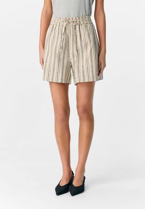 Beige randiga shorts med elastisk midja och dragsko. Tillverkade av ett lätt tyg, med vertikala blå och bruna ränder.