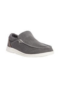 Scarpa slip-on in tessuto grigio con punta curva, suola in gomma bianca e dettagli di cucitura visibili lungo i bordi.