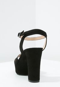 Unisa Sandaletter - black