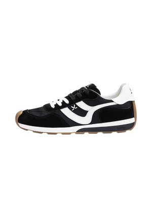 Black and white low-top sneaker with white side stripes, black and white laces, and a gum rubber sole.