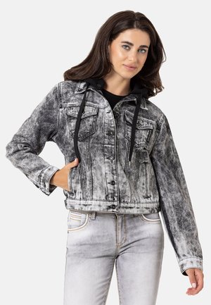 Black and white denim jacket with a hood, featuring a faded wash, button closure, two chest pockets, and a cropped design.