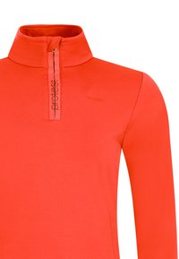 Oranje langemouwen top met een hoge kraag en een halve rits. Heeft een subtiel merklogo en een gladde, rekbare stof.