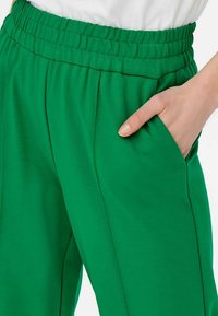 ONLY ONLPOPTRASH SUKI MW - Trainingsbroek - pepper green