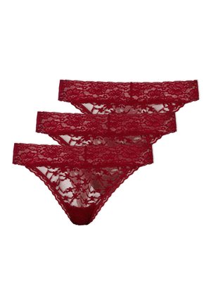 Red lace thongs, featuring floral patterns, sheer fabric, scalloped edges, and a comfortable waistband; sold as a pack of three.