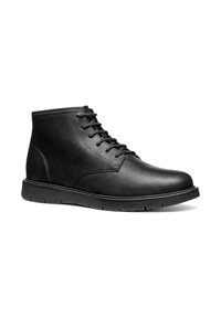 Svarta läderankelboots med en slät textur, rund tå och snördesign. Funktioner en gummisula och subtila sömdetaljer.