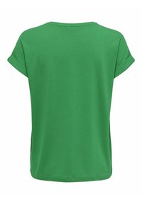 Chemise verte uni à manches courtes avec poignets retroussés, vue de dos sur un fond blanc.