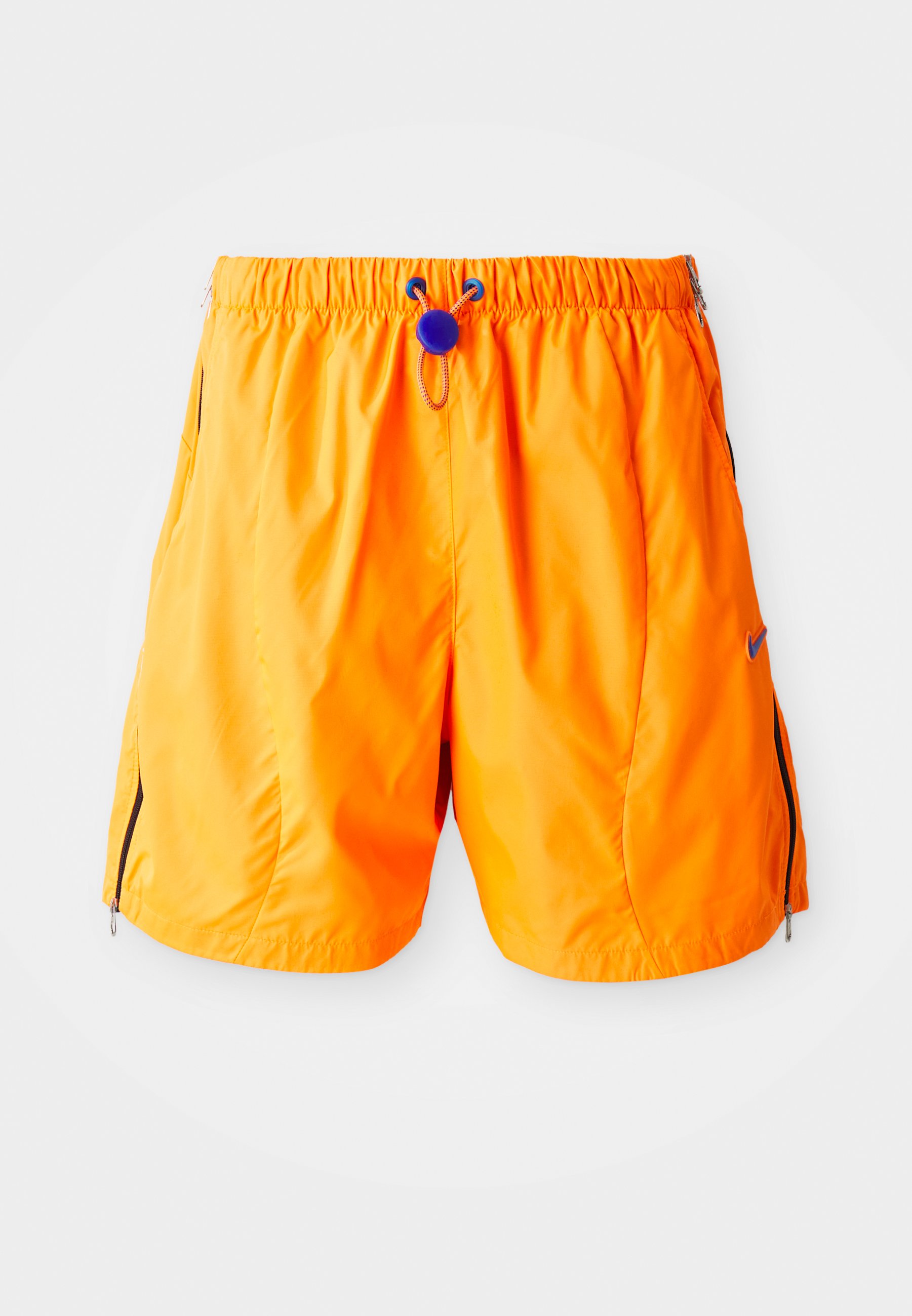 green red and yellow nike shorts