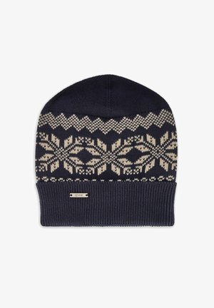 Granatowa dzianinowa czapka z kremowym geometrycznym wzorem. Posiada prążkowany mankiet oraz małą metalową plakietkę z logo. Miękka w dotyku.